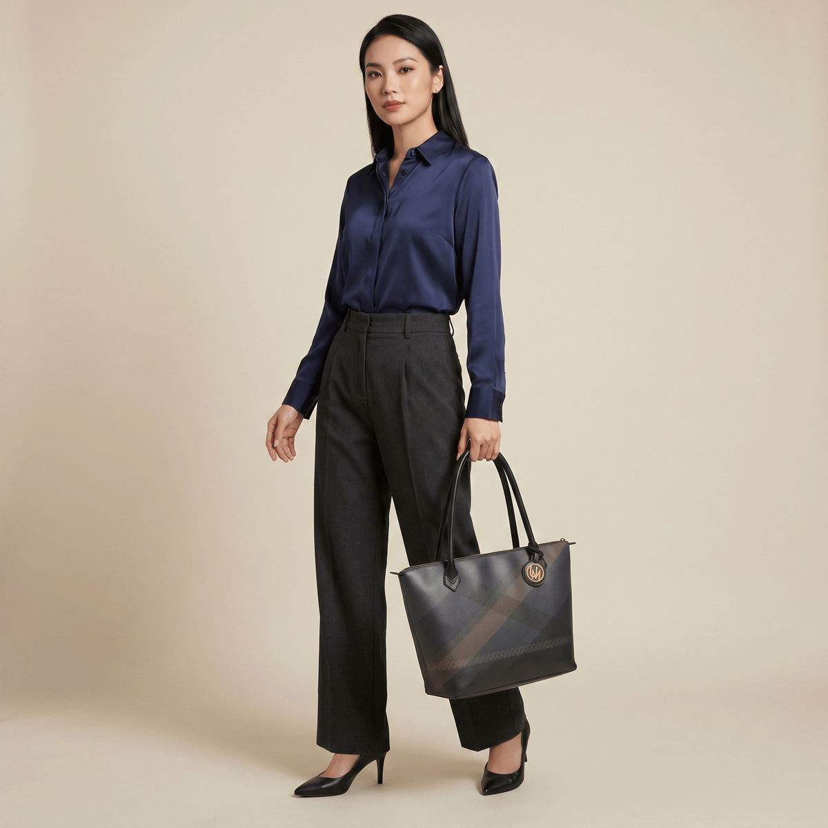 Designer leather tote bag with warm printed finish in studio styling